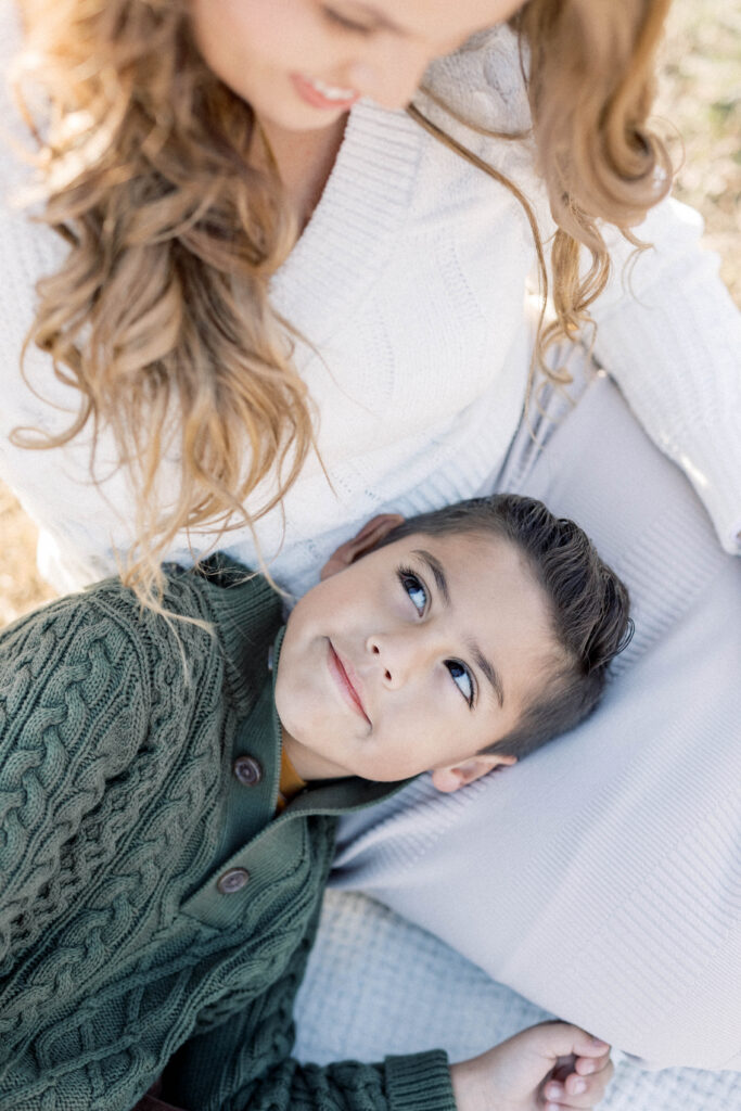 knoxville family photographer son laying in moms lap. Spring Break Ideas In Knoxville Tennessee