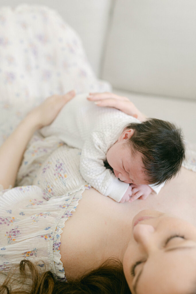 knoxville newborn photographer. baby laying on moms chest
