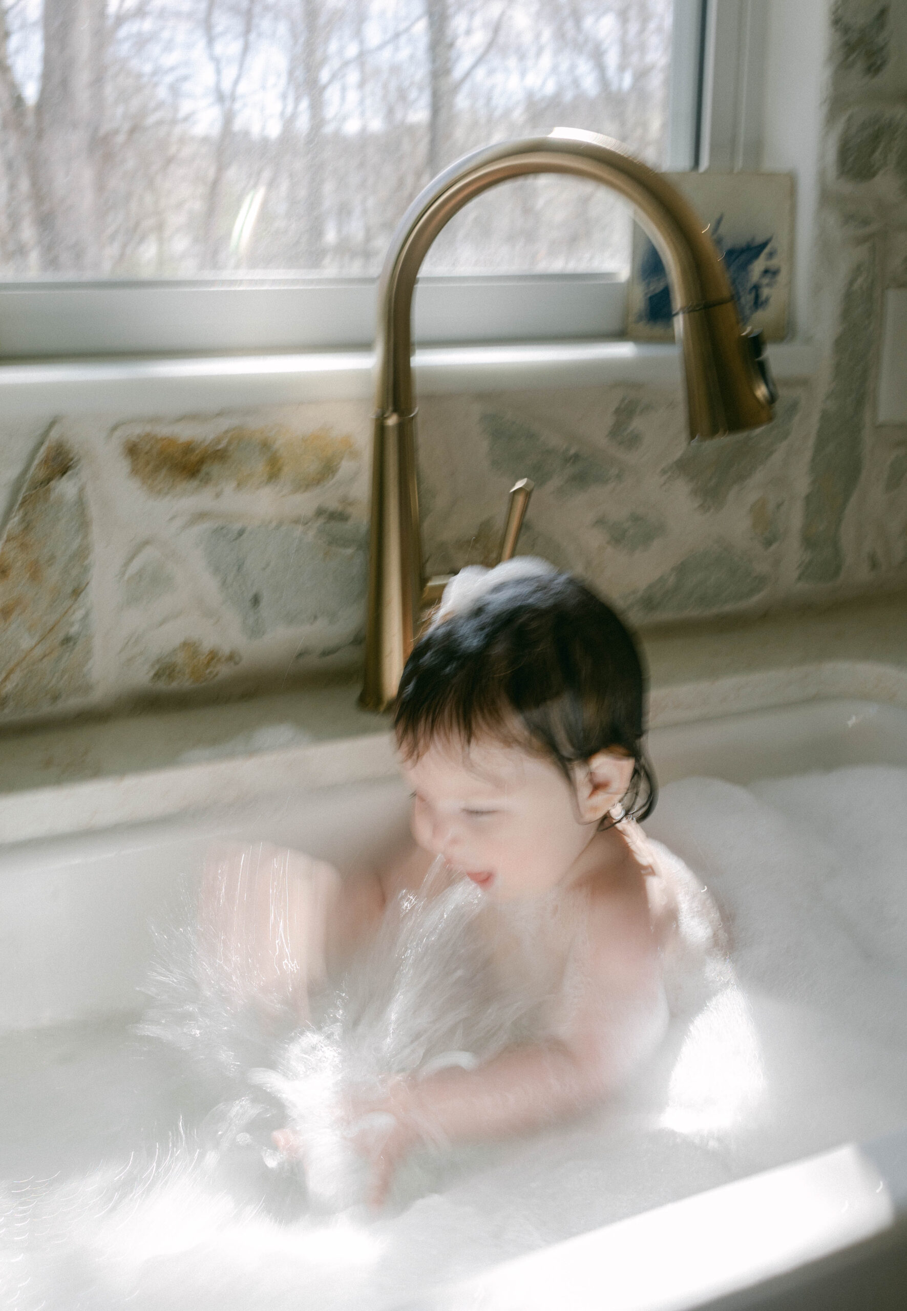 baby playing in sink knoxville tn family lifestyle session shot on film