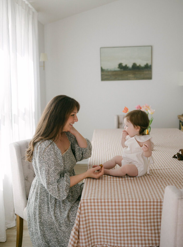 toddler laughing while playing with parents at home Knoxville TN