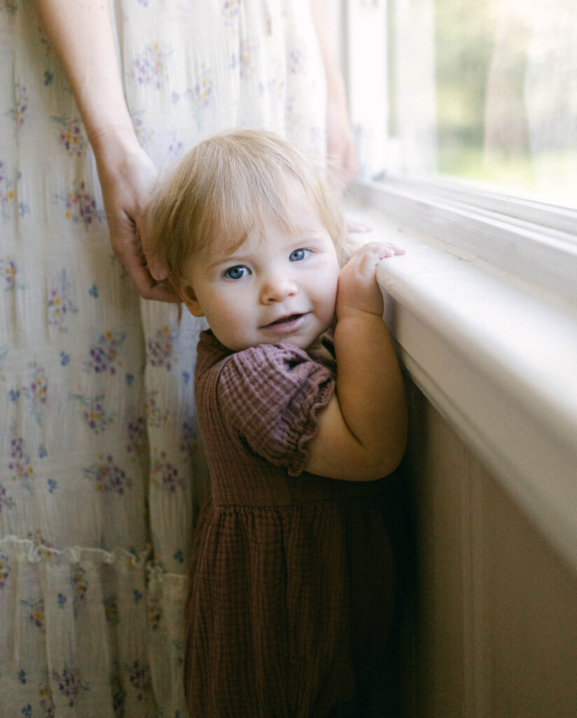 In-home family photography Knoxville TN featuring a baby nursery session